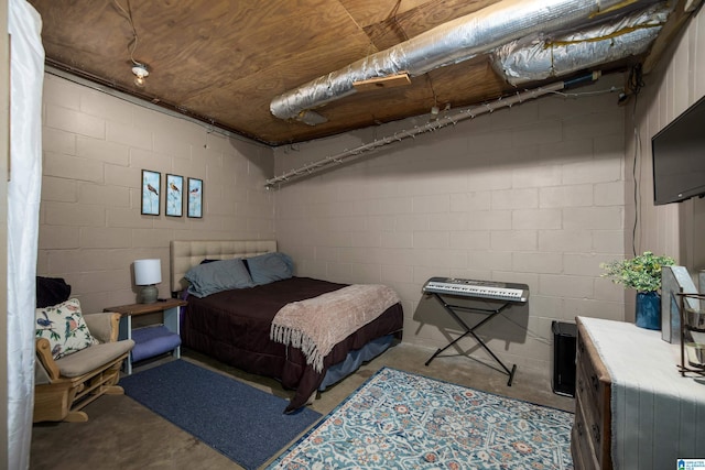 470 16th St, Calera, AL 35040 - bedroom with concrete floors and concrete block wall