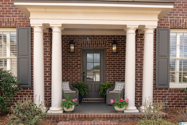 4460 Tuckahoe Ln, Hoover, AL 35226 - view of exterior entry with covered porch and brick siding