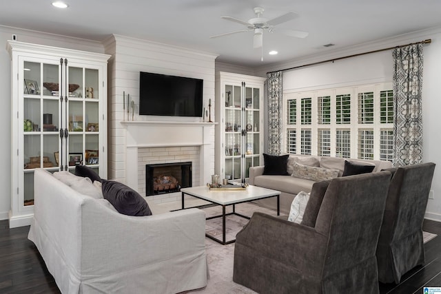 4460 Tuckahoe Ln, Hoover, AL 35226 - living room with a brick fireplace, a ceiling fan, ornamental molding, and wood finished floors