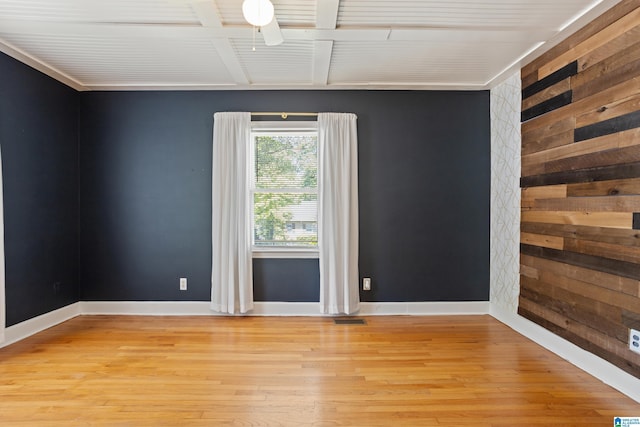 5605 7th Ave S, Birmingham, AL 35212 - empty room with baseboards, wooden walls, visible vents, and light wood-style floors