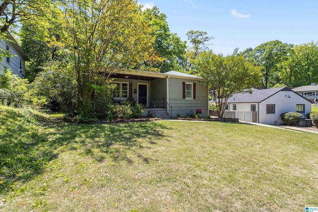 5605 7th Ave S, Birmingham, AL 35212 - view of front of house with a front lawn and covered porch