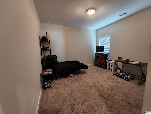 bedroom featuring carpet flooring, baseboards, and visible vents