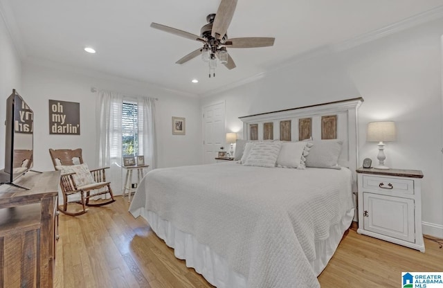 bedroom featuring recessed lighting, light wood-style floors, ornamental molding, and a ceiling fan