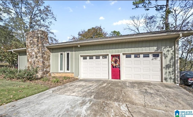 garage featuring driveway