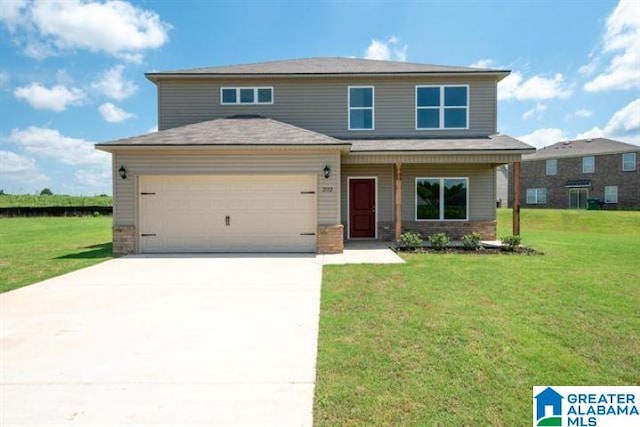 120 Woodland Way, Pell City, AL 35125 - view of front of house with brick siding, driveway, an attached garage, and a front lawn