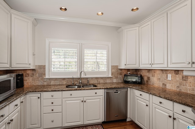 2240 Hillview Rd, Birmingham, AL 35022 - kitchen with a sink, ornamental molding, white cabinets, and stainless steel appliances