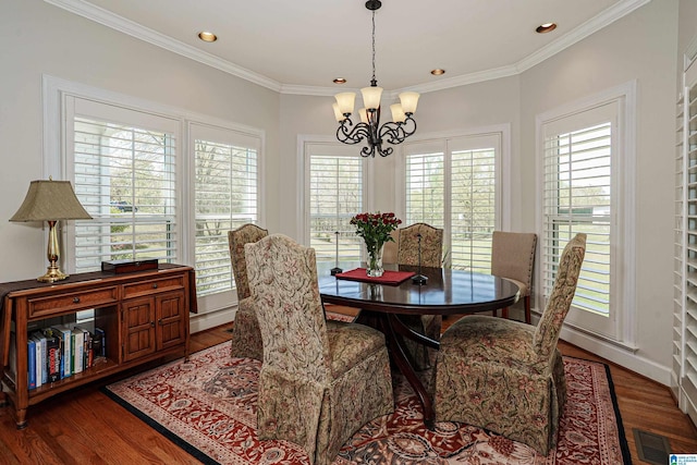 2240 Hillview Rd, Birmingham, AL 35022 - dining room with a chandelier, recessed lighting, crown molding, visible vents, and wood finished floors