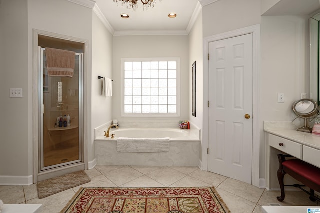 2240 Hillview Rd, Birmingham, AL 35022 - bathroom featuring baseboards, ornamental molding, a shower stall, tile patterned flooring, and a garden tub