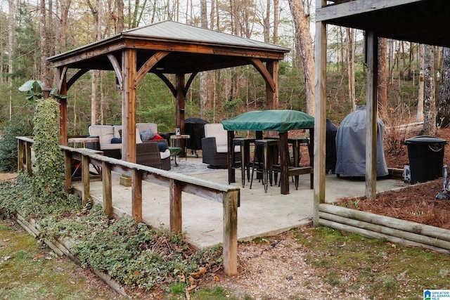 100 Edgewood Cir, Oneonta, AL 35121 - view of patio featuring an outdoor hangout area, a gazebo, a view of trees, and a grill