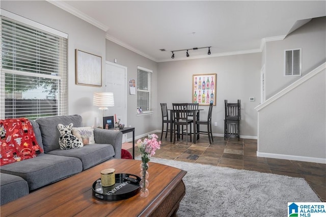 600 13th St E Unit 914, Tuscaloosa, AL 35401 - living area featuring crown molding, baseboards, rail lighting, stone finish flooring, and stairway