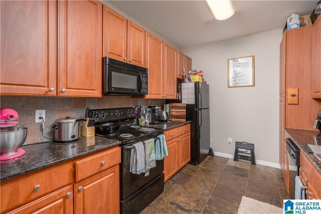 600 13th St E Unit 914, Tuscaloosa, AL 35401 - kitchen with black appliances, decorative backsplash, baseboards, dark stone counters, and brown cabinetry