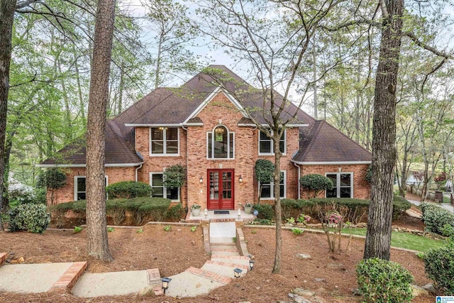 4049 Water Willow Ln, Hoover, AL 35244 - view of front of home featuring roof with shingles, brick siding, and french doors