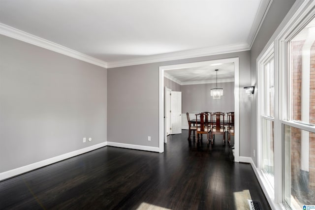 4049 Water Willow Ln, Hoover, AL 35244 - spare room featuring crown molding, an inviting chandelier, dark wood finished floors, visible vents, and baseboards