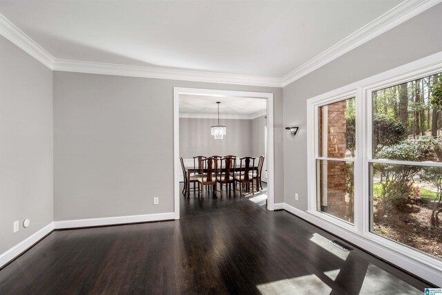 4049 Water Willow Ln, Hoover, AL 35244 - dining space with crown molding, baseboards, and dark wood-style floors
