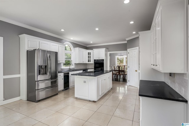 4049 Water Willow Ln, Hoover, AL 35244 - kitchen featuring plenty of natural light, a sink, black appliances, and dark countertops