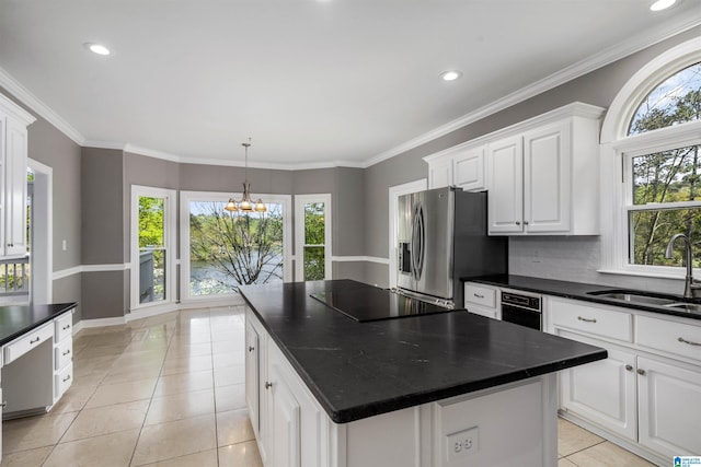 4049 Water Willow Ln, Hoover, AL 35244 - kitchen featuring stainless steel refrigerator with ice dispenser, a chandelier, dark countertops, a sink, and black electric stovetop