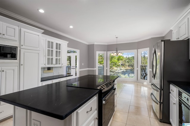 4049 Water Willow Ln, Hoover, AL 35244 - kitchen with white cabinets, an inviting chandelier, dark countertops, crown molding, and black appliances