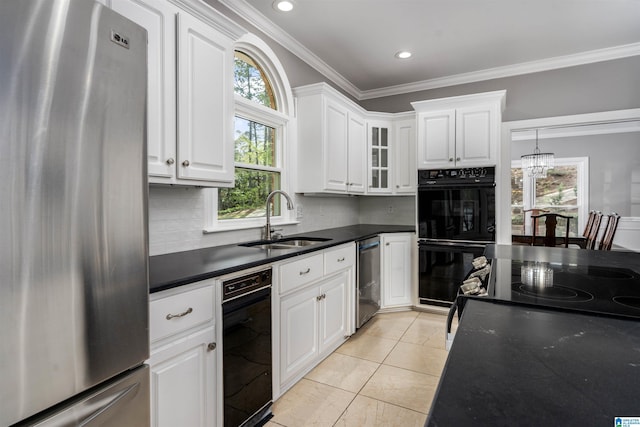 4049 Water Willow Ln, Hoover, AL 35244 - kitchen featuring crown molding, a sink, black appliances, and dark countertops