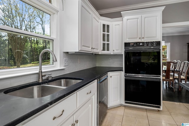 4049 Water Willow Ln, Hoover, AL 35244 - kitchen featuring crown molding, dobule oven black, tasteful backsplash, white cabinets, and a sink