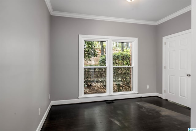 4049 Water Willow Ln, Hoover, AL 35244 - spare room with dark wood-style floors, baseboards, ornamental molding, and visible vents