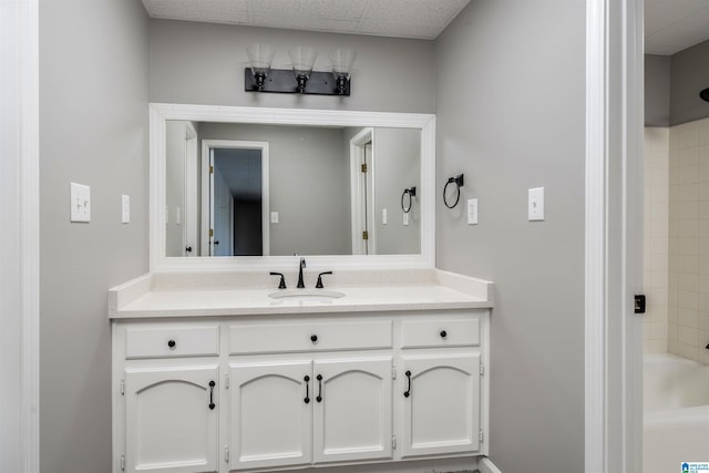 4049 Water Willow Ln, Hoover, AL 35244 - bathroom featuring a paneled ceiling and vanity
