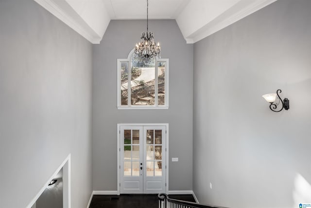 4049 Water Willow Ln, Hoover, AL 35244 - entryway featuring baseboards, a chandelier, vaulted ceiling, dark wood-type flooring, and french doors