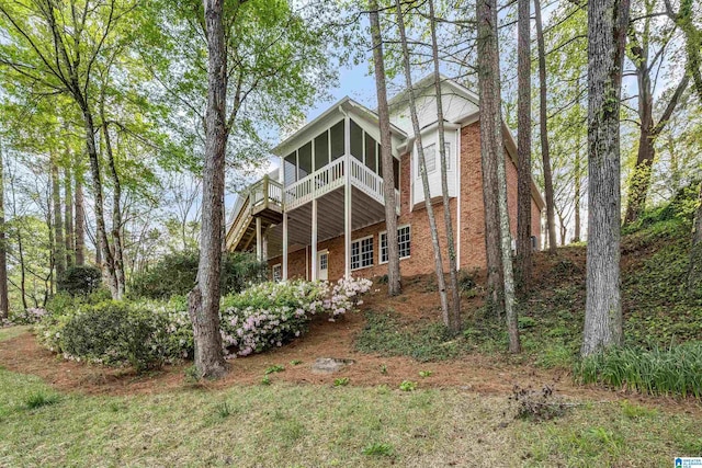 4049 Water Willow Ln, Hoover, AL 35244 - back of house featuring brick siding and a sunroom