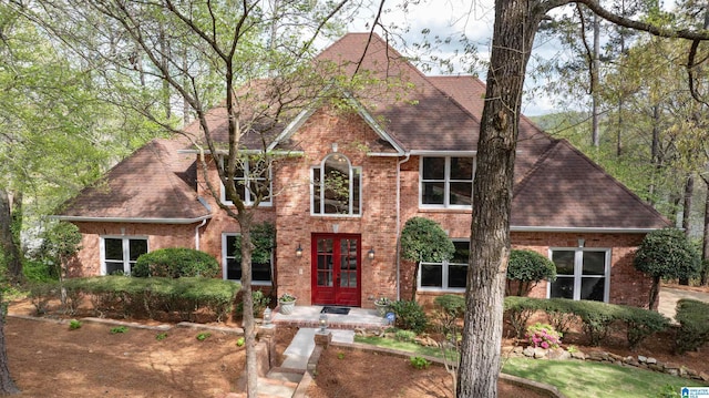 4049 Water Willow Ln, Hoover, AL 35244 - view of front facade with brick siding, french doors, and a shingled roof
