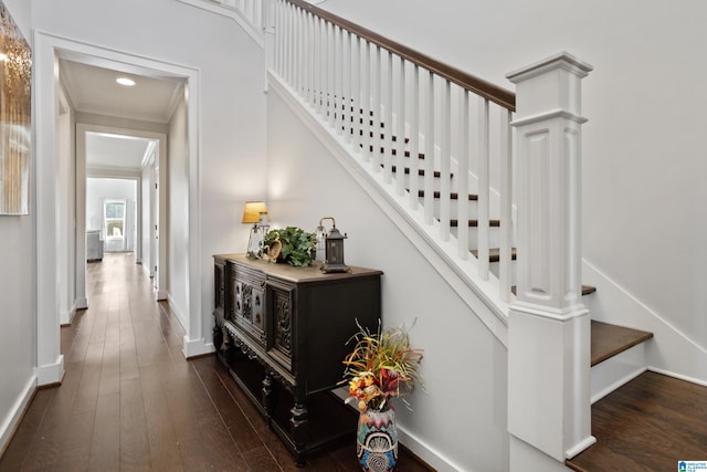 stairs featuring baseboards, recessed lighting, and hardwood / wood-style flooring