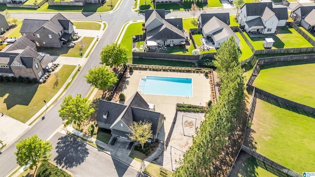 birds eye view of property with a residential view