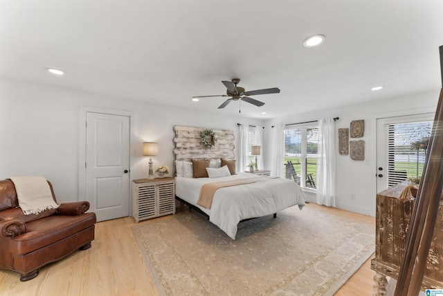 bedroom with a ceiling fan, access to outside, light wood-type flooring, baseboards, and recessed lighting