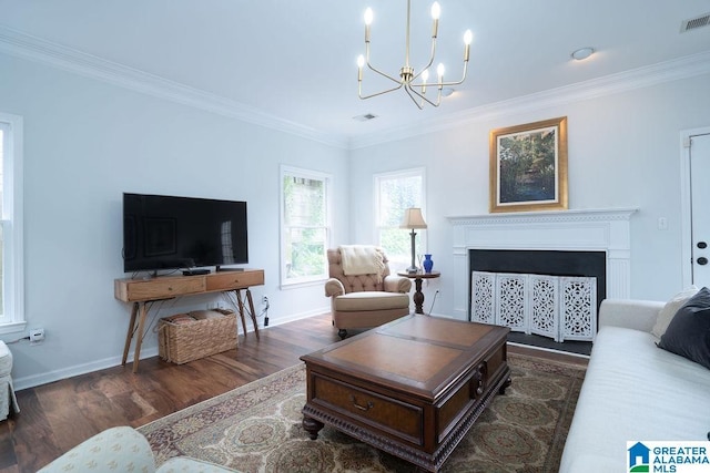 1595 Creekstone Cir, Birmingham, AL 35243 - living room with wood finished floors, crown molding, a chandelier, and a fireplace