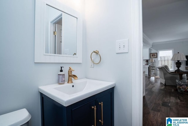 1595 Creekstone Cir, Birmingham, AL 35243 - half bath with vanity, crown molding, and wood finished floors