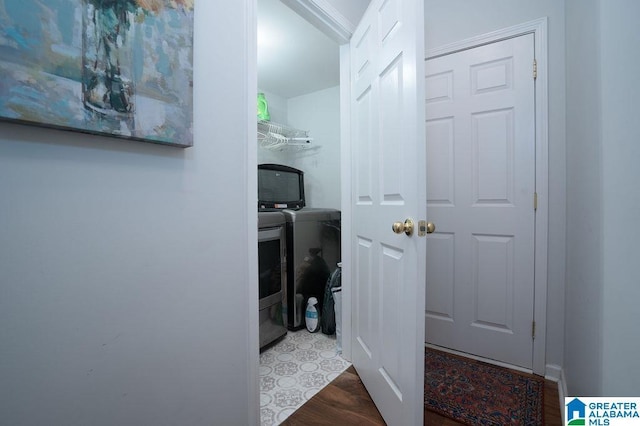 1595 Creekstone Cir, Birmingham, AL 35243 - hallway featuring independent washer and dryer and wood finished floors