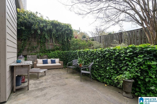 1595 Creekstone Cir, Birmingham, AL 35243 - fenced backyard with a patio and an outdoor living space
