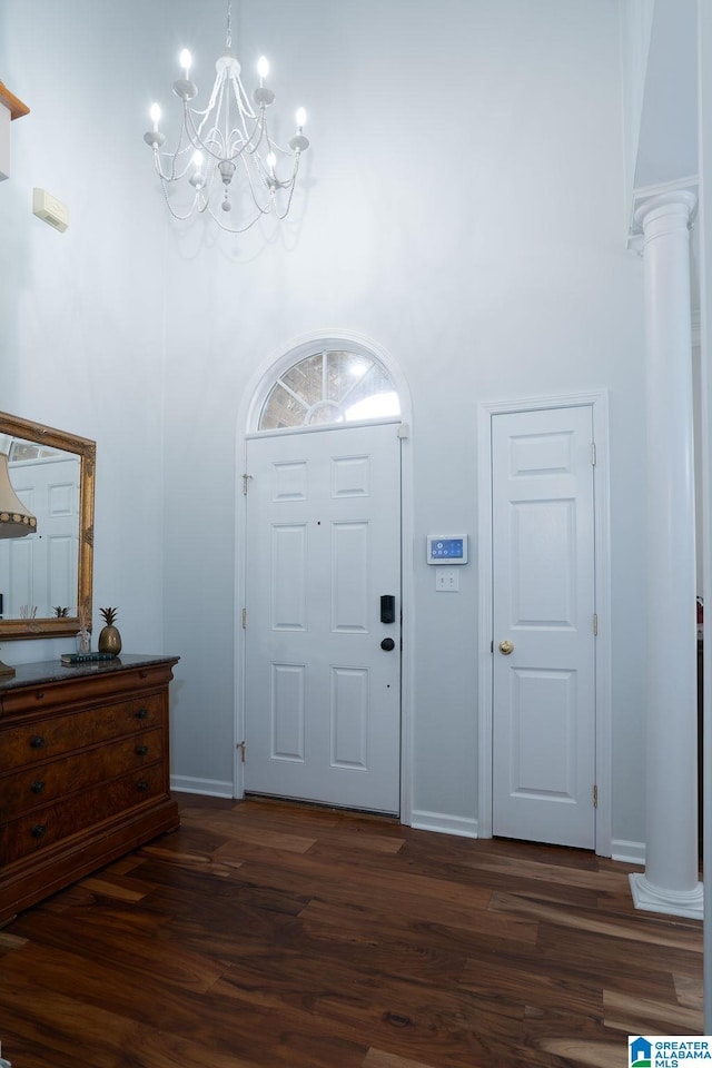 1595 Creekstone Cir, Birmingham, AL 35243 - foyer with a chandelier, a towering ceiling, dark wood-type flooring, and ornate columns