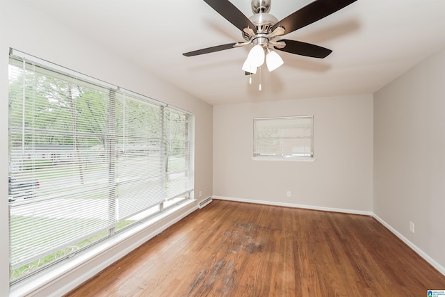 1625 Mann Dr, Birmingham, AL 35214 - spare room with baseboards, visible vents, ceiling fan, and wood finished floors