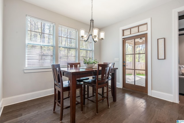 13147 Allison Dr, Lake View, AL 35111 - dining area with dark wood-type flooring, a notable chandelier, and baseboards