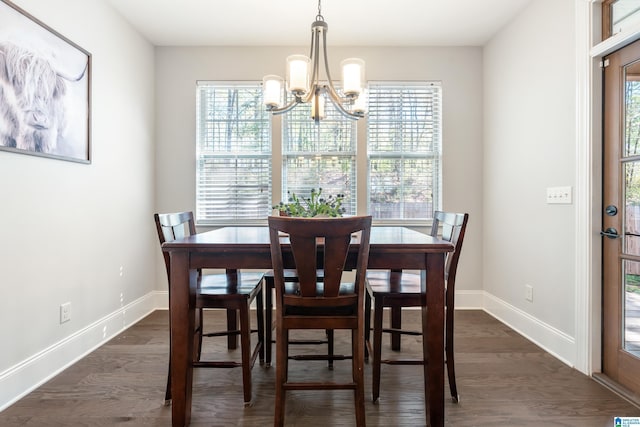 13147 Allison Dr, Lake View, AL 35111 - dining room with dark wood-style flooring, baseboards, and a chandelier