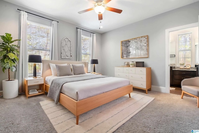 13147 Allison Dr, Lake View, AL 35111 - bedroom featuring ensuite bathroom, baseboards, a ceiling fan, and light colored carpet