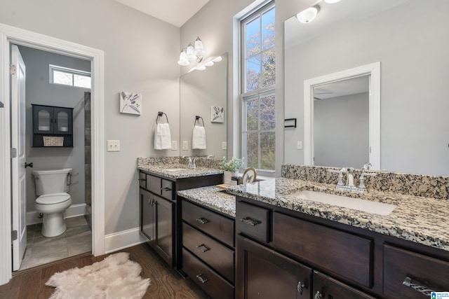 13147 Allison Dr, Lake View, AL 35111 - bathroom featuring toilet, wood finished floors, vanity, and baseboards
