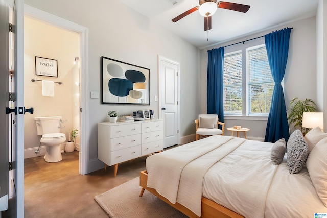 13147 Allison Dr, Lake View, AL 35111 - bedroom featuring finished concrete floors, baseboards, a ceiling fan, and connected bathroom