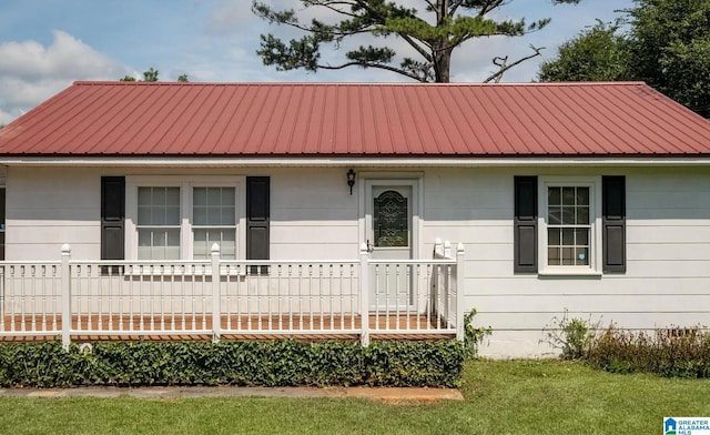 view of front of property with metal roof