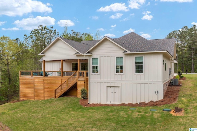 2505 Shore Side Ln, Sylacauga, AL 35151 - back of property with roof with shingles, stairway, a yard, and board and batten siding