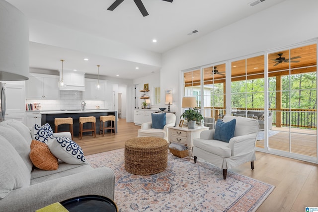 2505 Shore Side Ln, Sylacauga, AL 35151 - living room with recessed lighting, visible vents, light wood-type flooring, and a ceiling fan