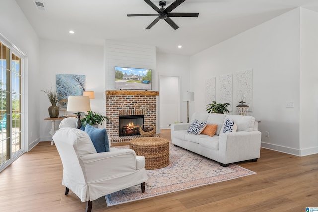 2505 Shore Side Ln, Sylacauga, AL 35151 - living room featuring visible vents, baseboards, a ceiling fan, and wood finished floors