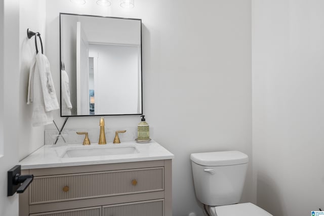 2505 Shore Side Ln, Sylacauga, AL 35151 - half bathroom featuring toilet and vanity