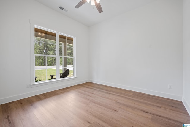 2505 Shore Side Ln, Sylacauga, AL 35151 - spare room with light wood finished floors, ceiling fan, baseboards, and visible vents