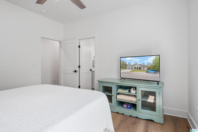 2505 Shore Side Ln, Sylacauga, AL 35151 - bedroom featuring baseboards, a ceiling fan, and wood finished floors