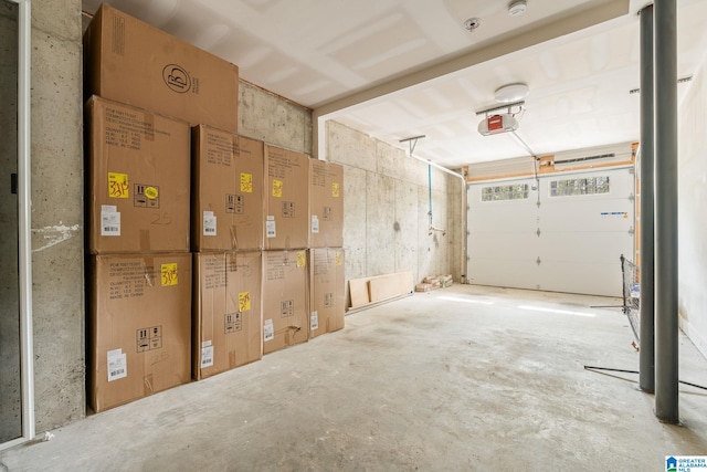 garage featuring a garage door opener